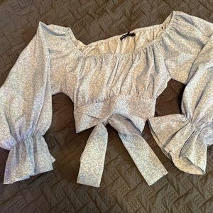 Floral flounce sleeve tie back top